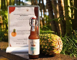 On The Wagon x Grand Hyatt Hong Kong exclusive collaboration flavor Pineapple Kombucha with menu card and a pineapple